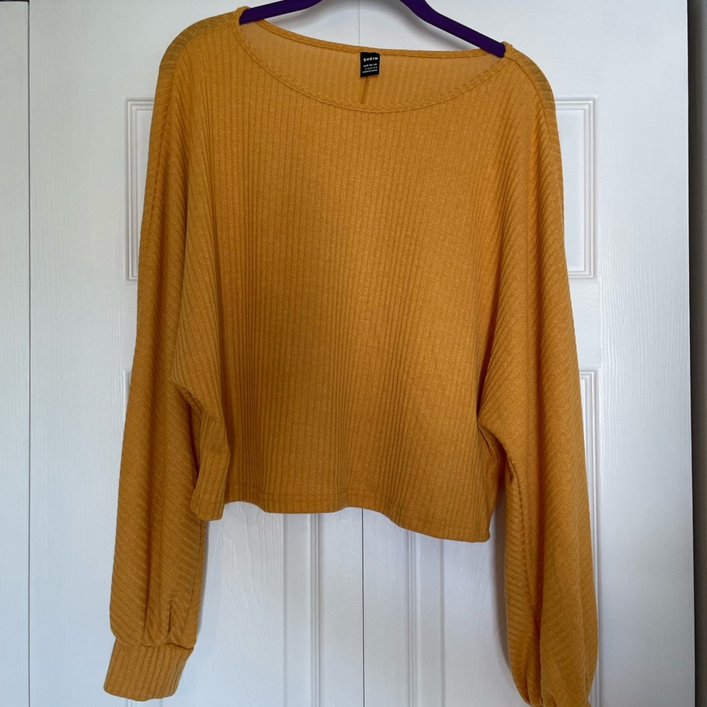 Cropped long sleeve sweater
